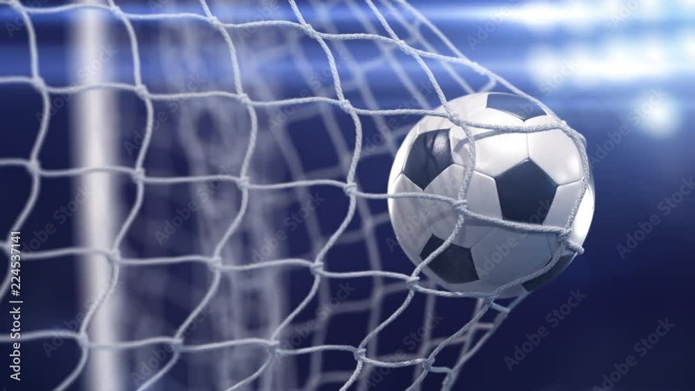 Beautiful soccer ball flies into net. Projector of light on a background. In slow motion