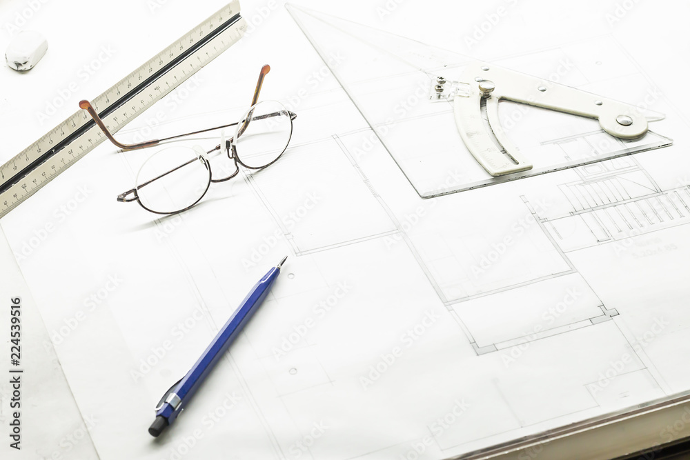 Architect at work. Drawing and tools copyspace. Architect at work. Drawing and tools copyspace.