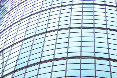 underside panoramic and perspective view to steel blue glass high rise building skyscrapers  business concept of successful industrial architecture