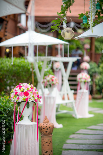 Luxury wedding decorate with flower at outdoor park.