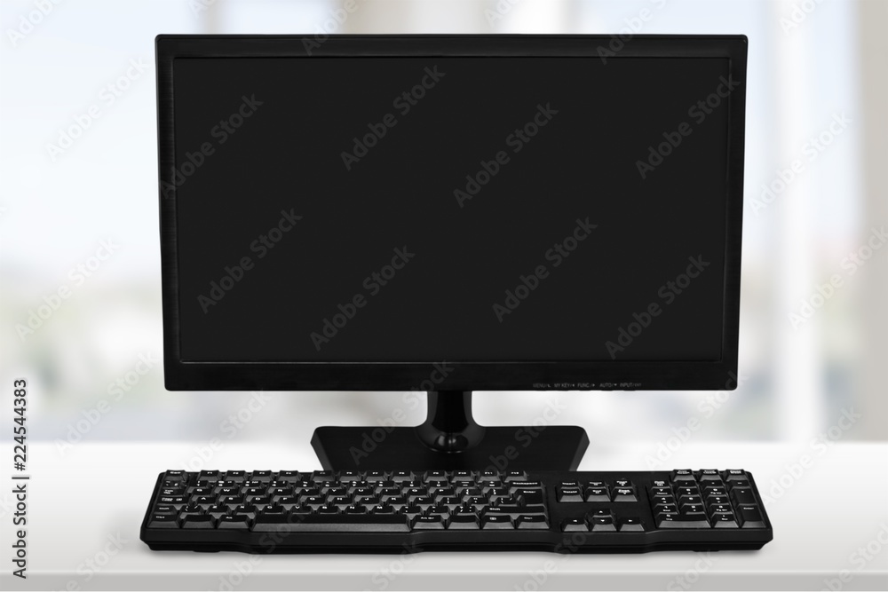 Desktop computer and keyboard on background Desktop computer and keyboard on background