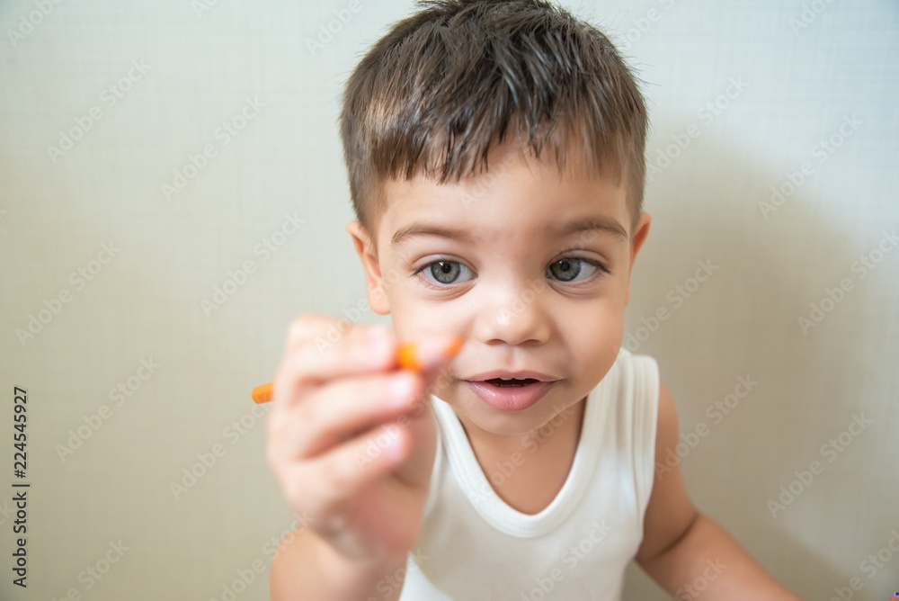 Cute baby boy toddler - holding colored pencils Cute baby boy toddler - holding colored pencils