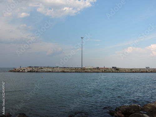 beach in the Adriatic sea with blue water, plants, yellow sand and with a wonderful panorama, hdr photos and made with a tripod