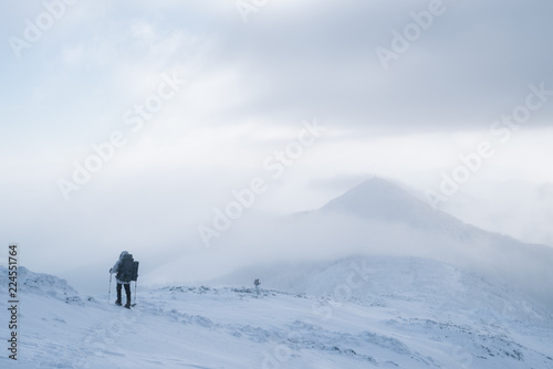 Winter hike in the mountains on snowshoes