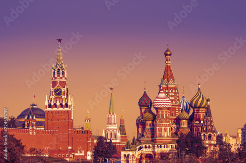 View on Spasskaya Tower and Saint Basil's Cathedral at Red Square of the Moscow Kremlin, Moscow, Russia. Toned image