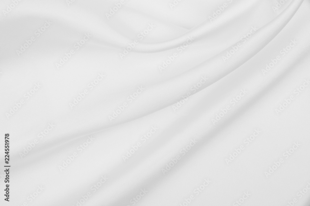 Smooth elegant white silk or satin luxury cloth texture as wedding background. Luxurious background design Smooth elegant white silk or satin luxury cloth texture as wedding background. Luxurious background design