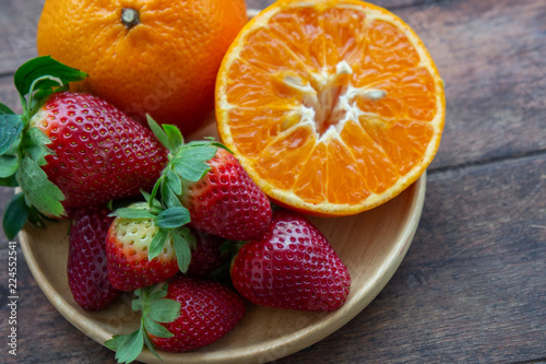 Fototapeta Naklejka Na Ścianę i Meble -  strawberry and orange fruit vitamin diet for healthy