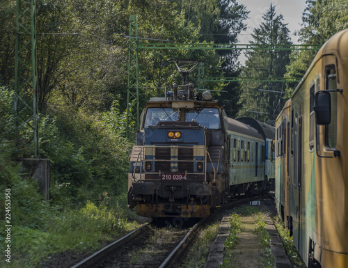 Blue electric train in station Rozmberk nad Vltavou