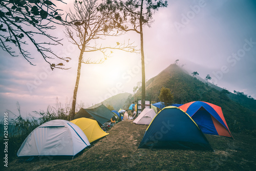 Adventure Camping and tent on the top of mountain , Hiker take a rest on this camp , Travel Concept at Khao Chang Phueak , Thong Pha Phum National Park ,Thailand photo