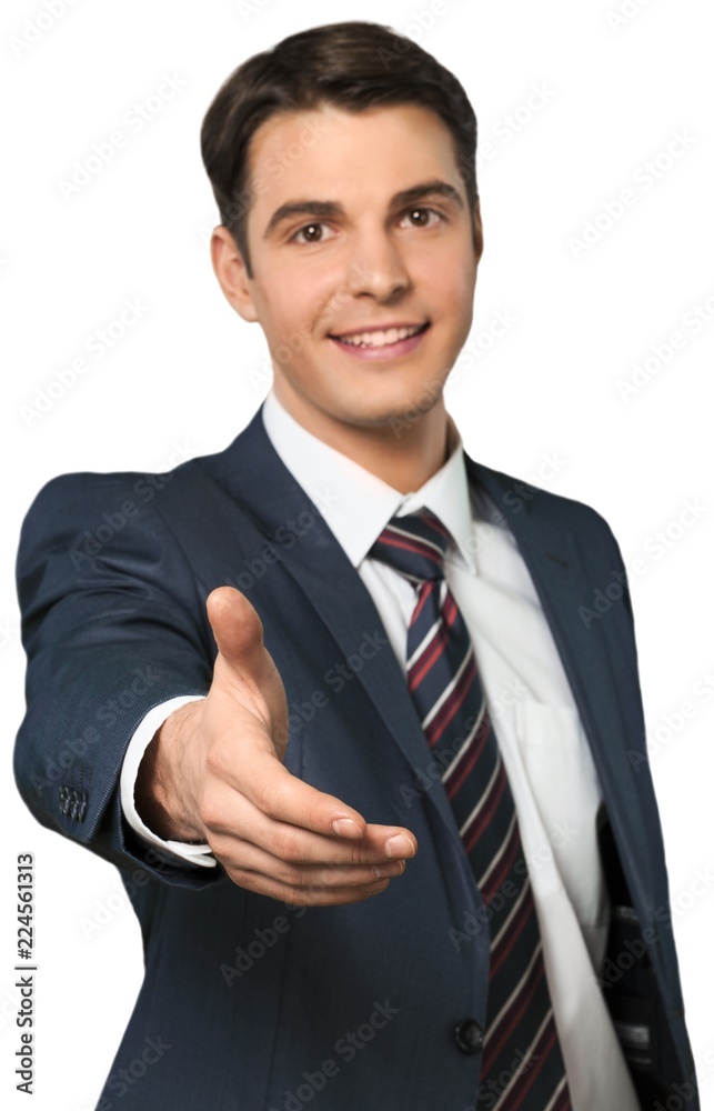 Friendly Businessman Offering Handshake - Isolated Friendly Businessman Offering Handshake - Isolated