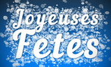 Joyeuses Fetes - white text written on blue bokeh effect background