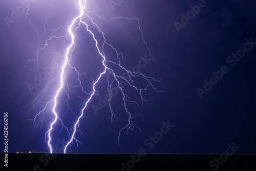 Thunderstorm lightning bolt strike