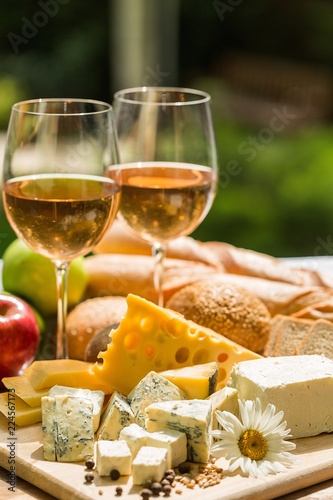 Glasses of Wine with Cheese, Bread and Apples