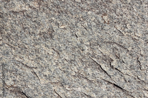 Granite background. Texture of gray granite stone. Natural pattern in gray tones. Abstract background