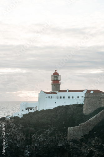 View of the lighthouse and cliffs at Cape St. Vincent in Portugal. The most south-western point of Europe. © franz12