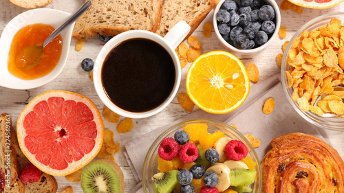 coffee cup with fruit and bread