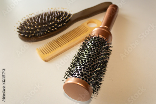 Combs of different shapes are on the table