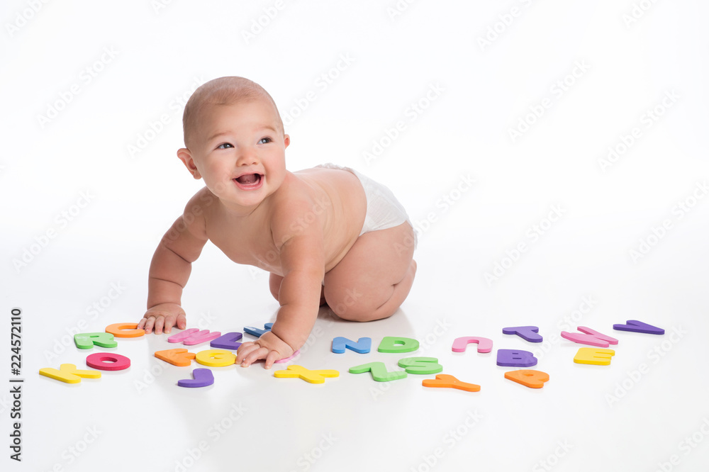 Smiling Baby Boy Playing with Alphabet Toys Smiling Baby Boy Playing with Alphabet Toys