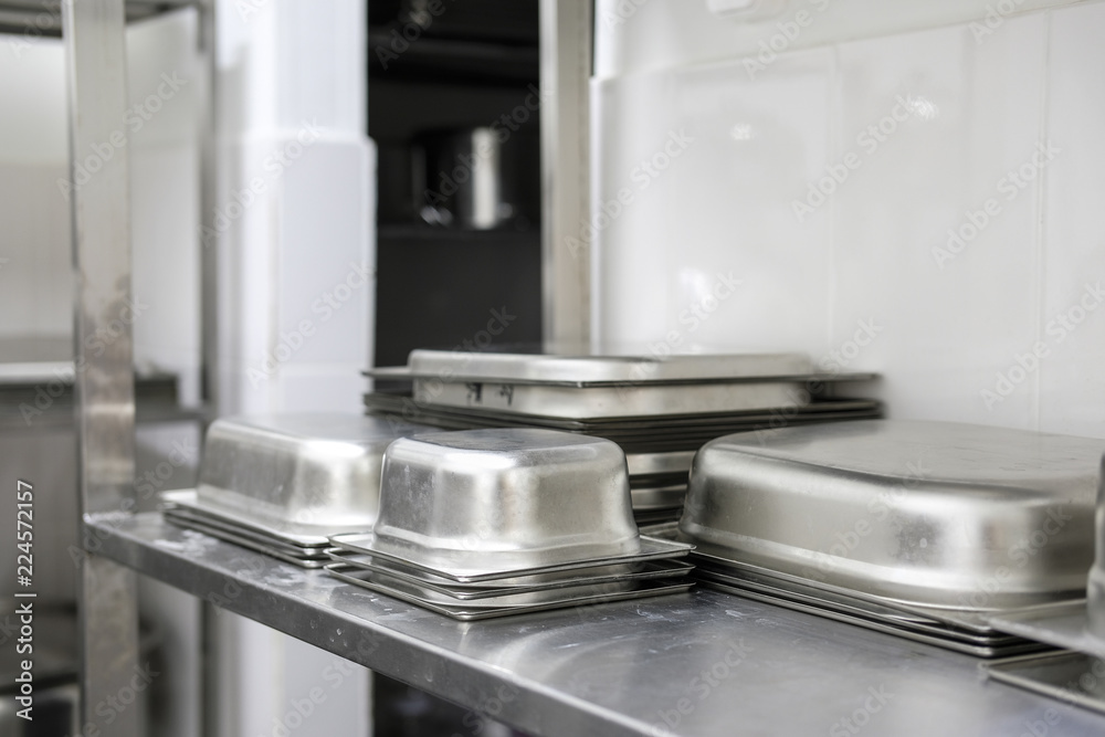 Utensils on a a professional kitchen Utensils on a a professional kitchen
