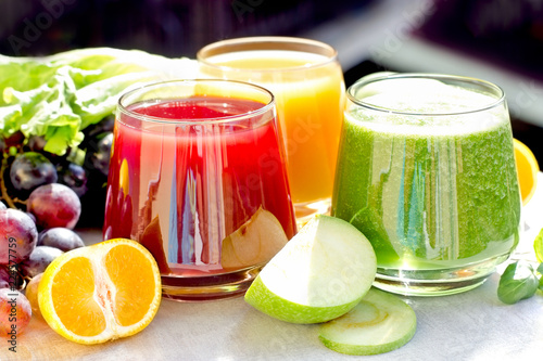 Blended fresh fruit and vegetable - healthy drink on table