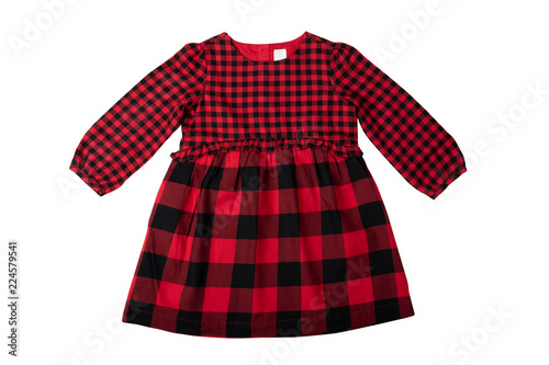 Clothes for children. A beautiful red and black checkered girl dress isolated on a white background. Children fashion.