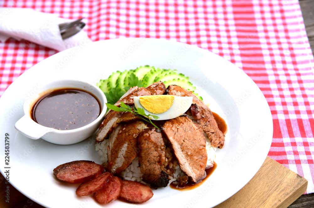 Barbecued red pork in sauce with rice..Thai Pork Menu. Barbecued red pork in sauce with rice..Thai Pork Menu.