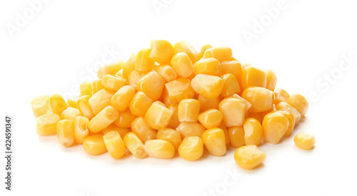 Tasty ripe corn kernels on white background