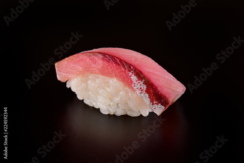 White fish nigiri sushi isolated on black background