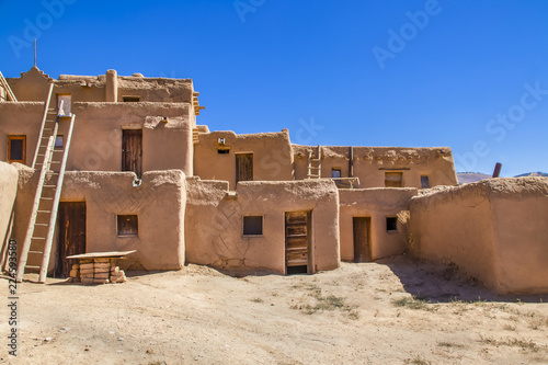 Multi-story adobe buildings from Taos Pueblo in New Mexico where Indigenous people are still living after over a thousand years