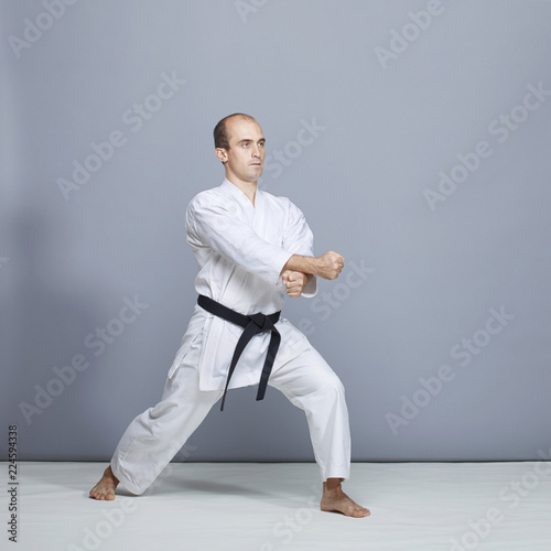 In a karate stand, athlete train formal karate exercises