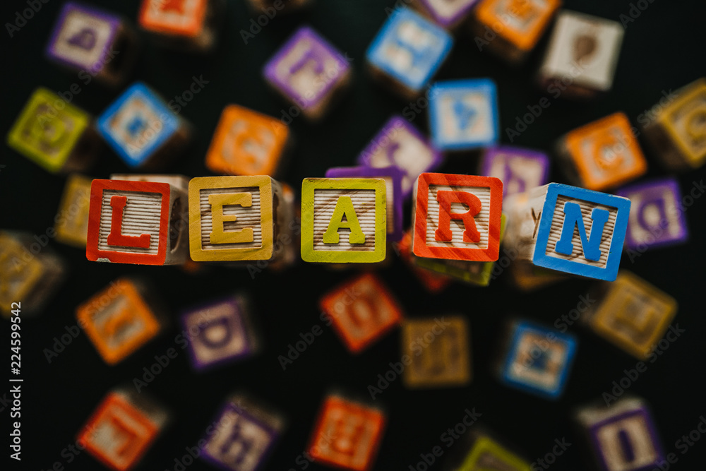 .Wooden squares with letters. Concept of learning Blocks for children ...