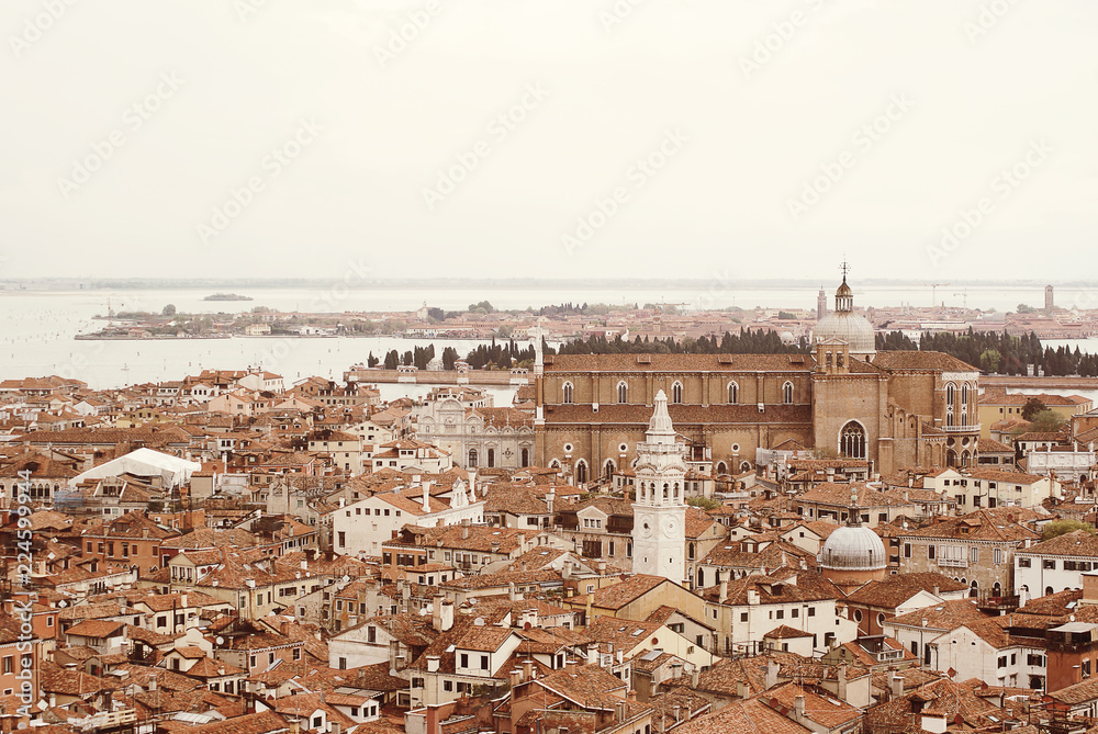 Venice roofs from above. Aerial view of houses, sea and palaces from San Marco tower