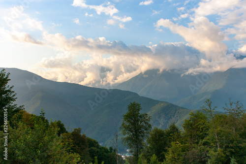 Beautiful summer landscape in the mountains with sun at dawn