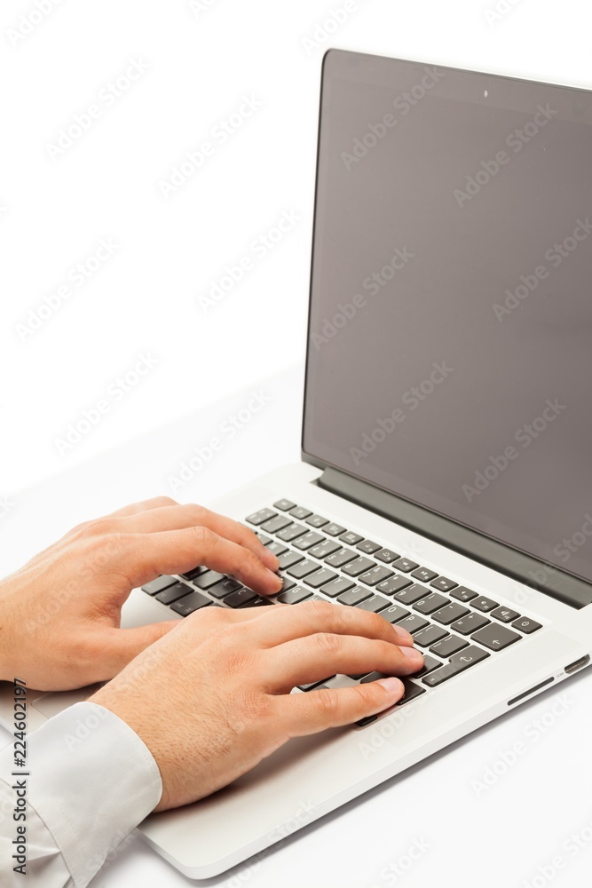 Closeup of a Businessman Typing on a Laptop Closeup of a Businessman Typing on a Laptop