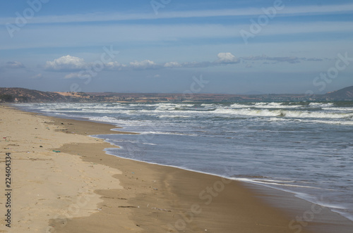 Windy day on sandy beach in Mui Ne, Vietnam