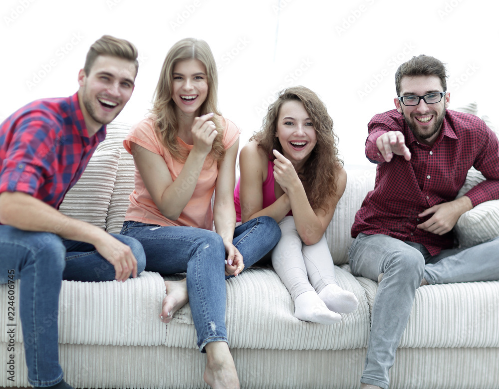group of cheerful friends watching their favorite movie group of cheerful friends watching their favorite movie