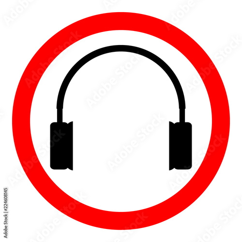 Prohibition sign headphones on white.