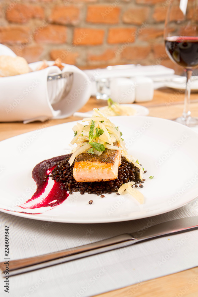 Baked salmon, beetroot mousse, black lentils and pear