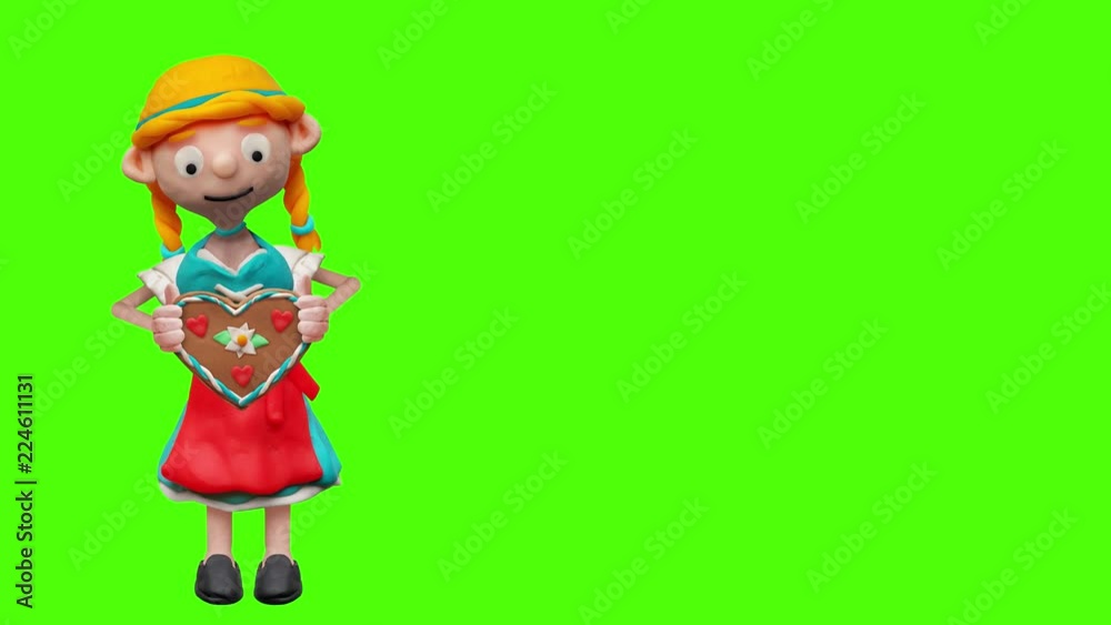 Frau aus Knete im Dirndl mit Lebkuchenherz – Animation Frau aus Knete im Dirndl mit Lebkuchenherz – Animation