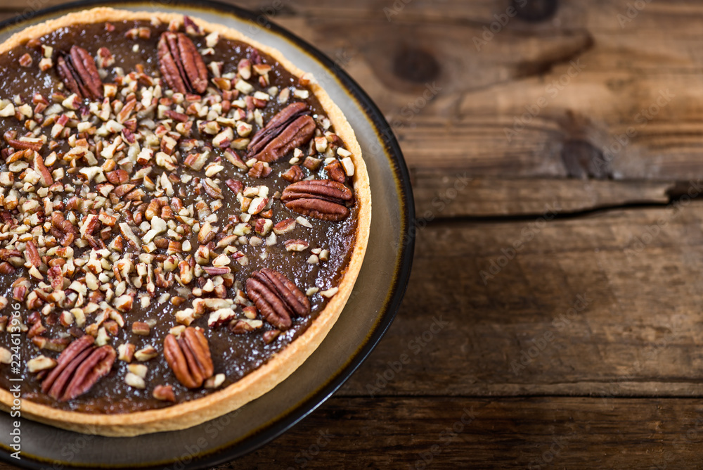 Pecan Pie, made from butter enriched pastry with golden syrup, maple sauce and breadcrumbs
