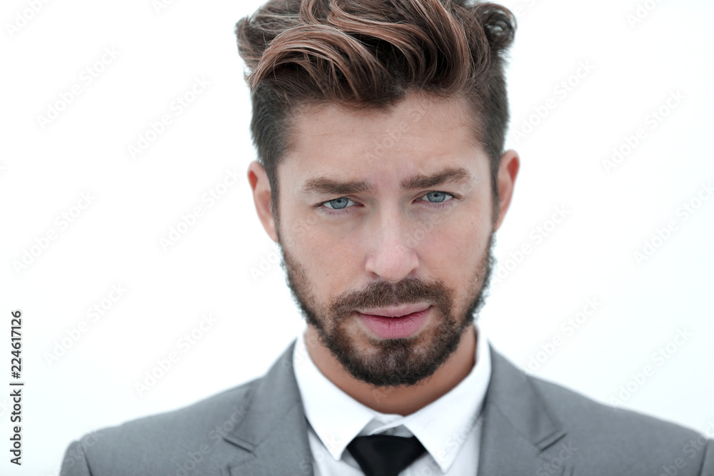 Serious businessman wearing suit and tie. blue background Serious businessman wearing suit and tie. blue background