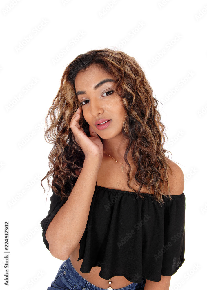 Beautiful young woman with brunette hair hand on face Beautiful young woman with brunette hair hand on face