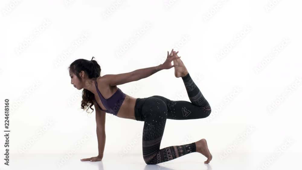 amazing female yoga instructor moving between poses against white background amazing female yoga instructor moving between poses against white background