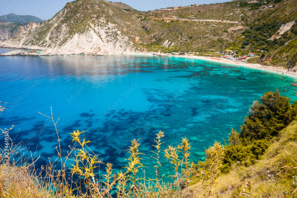picturesque panorama of Petani beach. crystal clear water, tranquil bay. Favorite tourist visiting destination at summer on Kefalonia island, Greece, Europe