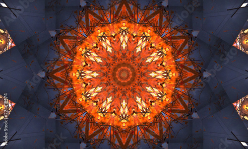 Dark blue and bright orange mandala Art with a beautiful repetitive pattern.