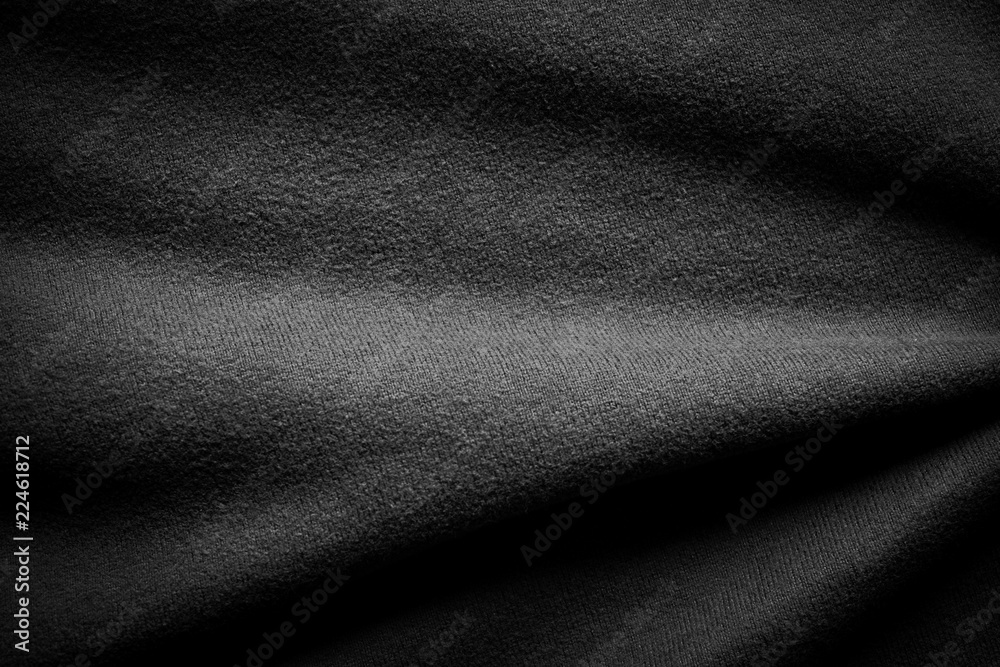 Fototapeta premium Black background abstract cloth texture luxury silk dark fabric.