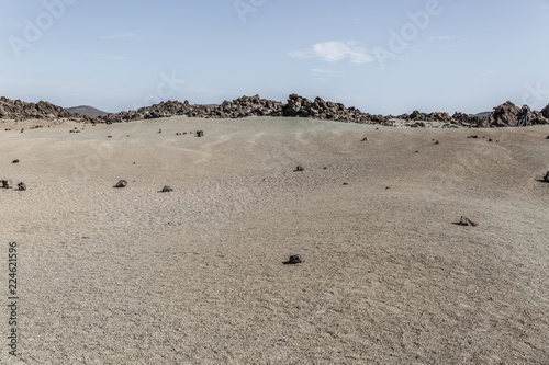 Fototapeta Naklejka Na Ścianę i Meble -  Teide national park area with rocky areas and sand on a sunny day, Tenerife island