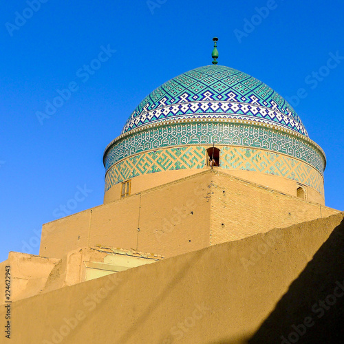 Decorated blue dome of the Bogheh-ye Seyed Roknaddin mausoleum in Yazd in eastern Iran photo