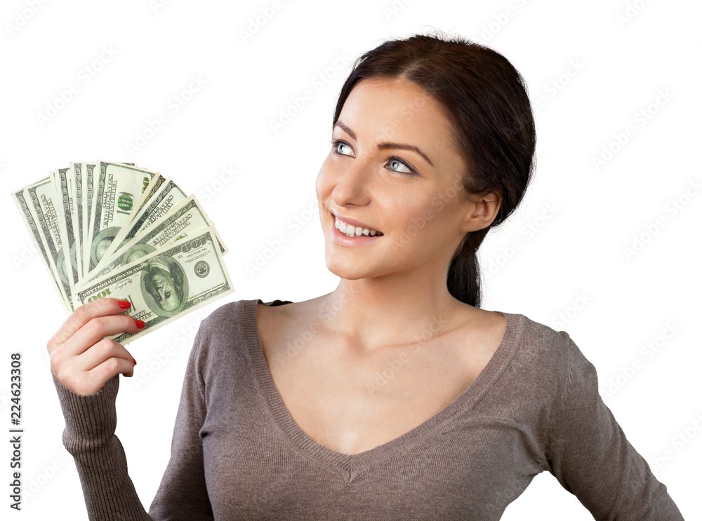 Pretty young business woman holding money isolated on white Pretty young business woman holding money isolated on white