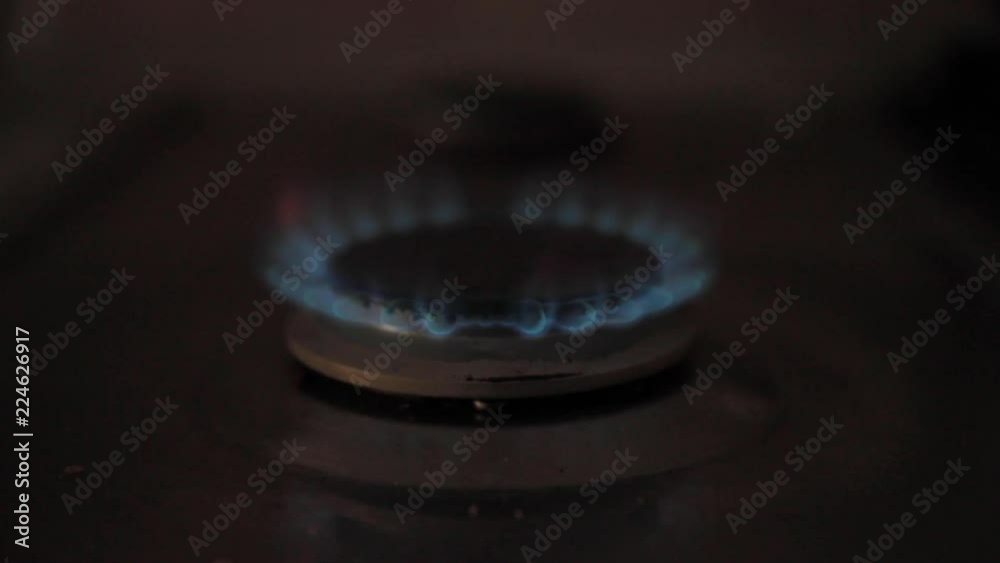 Ignition of the gas stove in the afternoon before cooking in slow motion